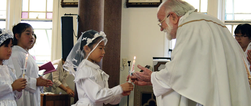 Fr. Barry Cairns celebrates First Communion Mass