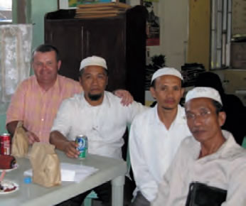 Fr. Paul Glynn with 3 Muslim clerics in Mindanao